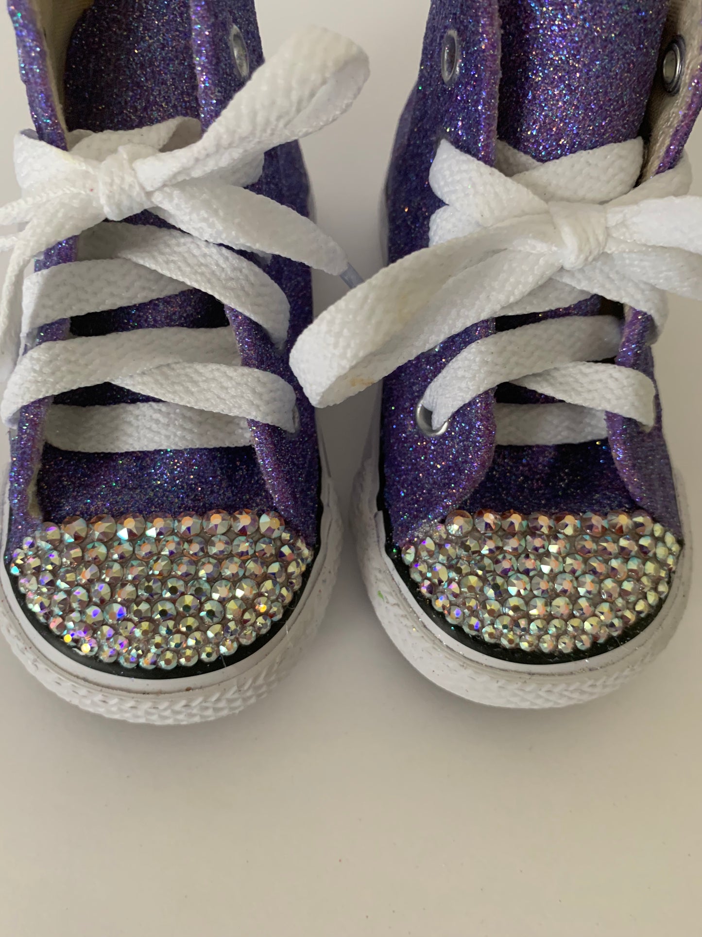 Low top glitter sneakers with jeweled  toes